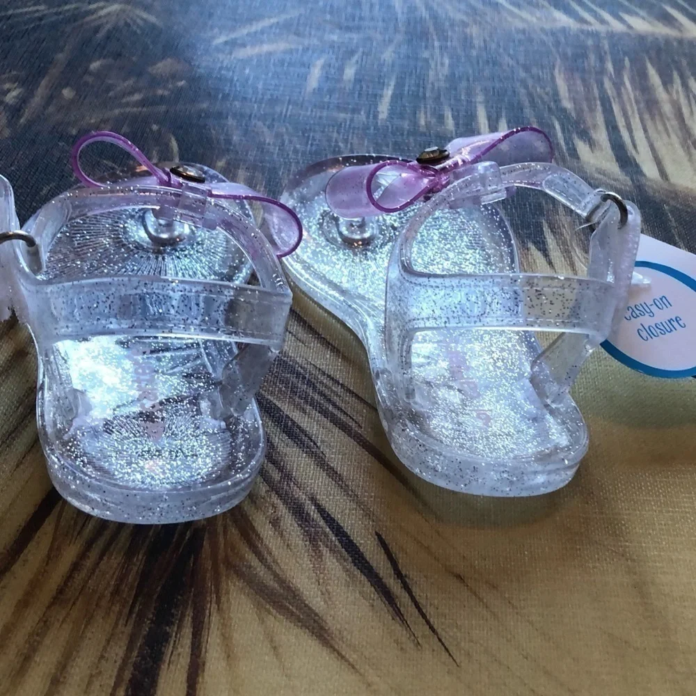 🆕 Carter’s Selena sparkly bow clear j…
